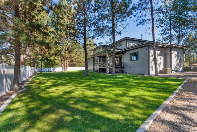 view of yard with a wooden deck