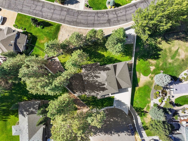 birds eye view of property with a mountain view