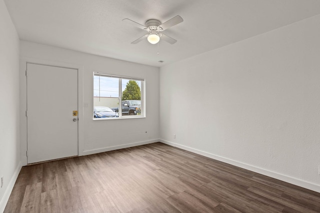 interior space featuring ceiling fan and hardwood / wood-style flooring