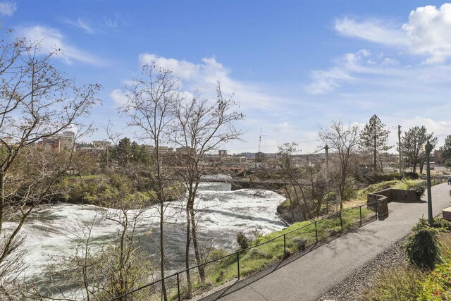 820 N Post St Unit 106, Spokane, WA 99201 - property view of water featuring fence