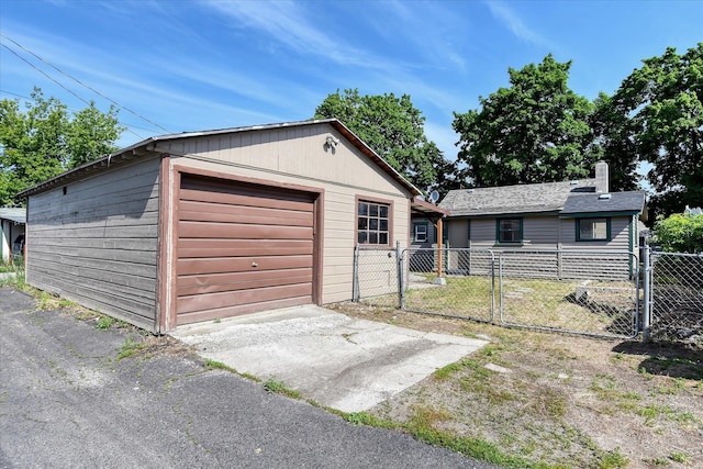 view of front of house with an outbuilding and a garage