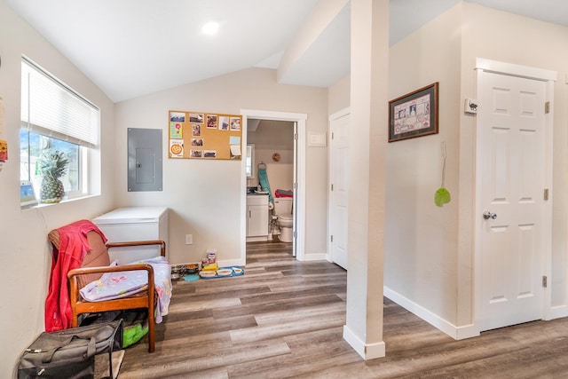 2213 E E Gordon Ave, Spokane, WA 99207 - living area featuring electric panel, wood finished floors, baseboards, and vaulted ceiling