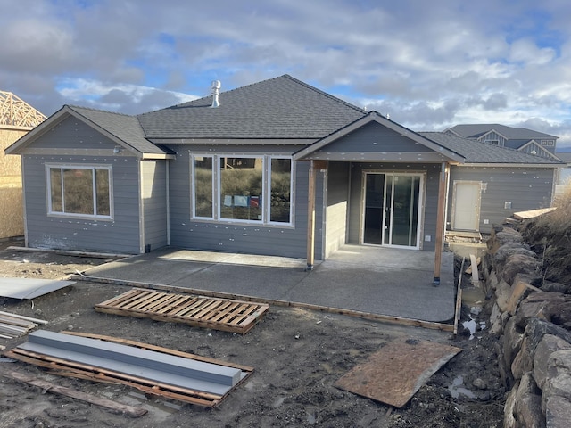 rear view of property with a patio area