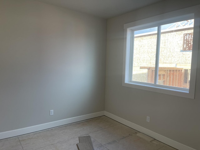 empty room featuring a wealth of natural light