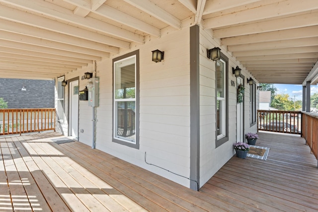 wooden terrace with covered porch