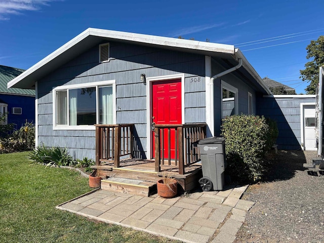 view of front of home with a front yard