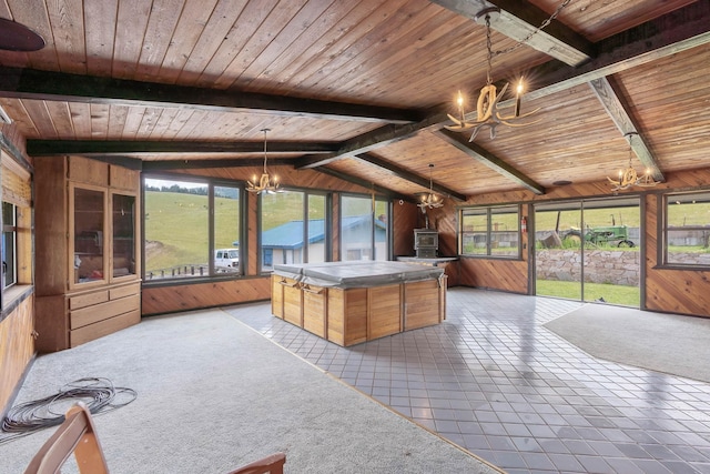 unfurnished sunroom featuring lofted ceiling with beams, a chandelier, and wooden ceiling