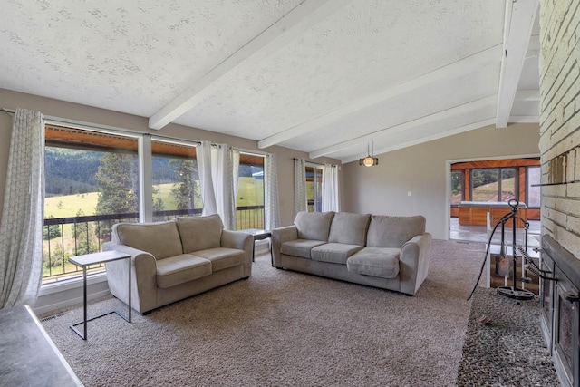 living room featuring vaulted ceiling with beams, a textured ceiling, and carpet floors