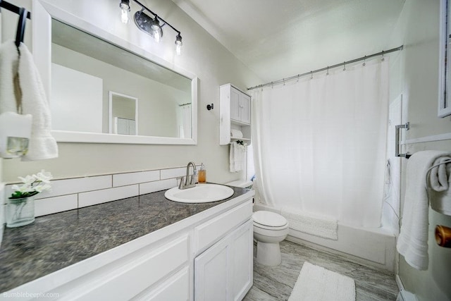 full bathroom with shower / bathtub combination with curtain, wood-type flooring, vanity, and toilet