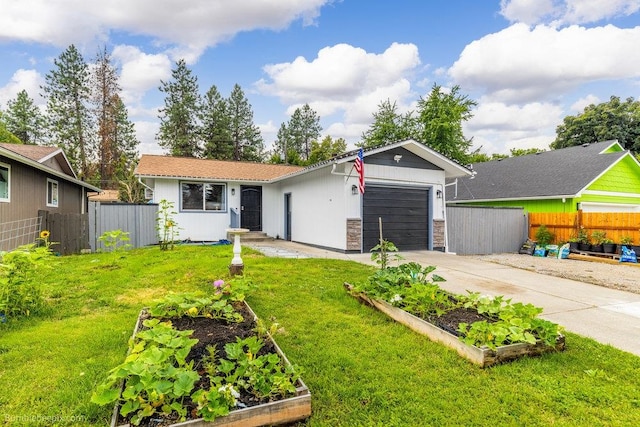 ranch-style home featuring a front yard and a garage