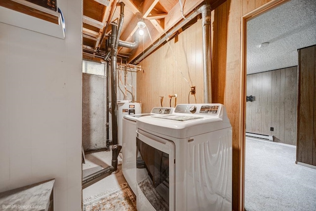 clothes washing area featuring wood walls, baseboard heating, hookup for a washing machine, and carpet flooring