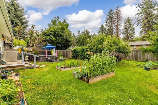 view of yard with a wooden deck