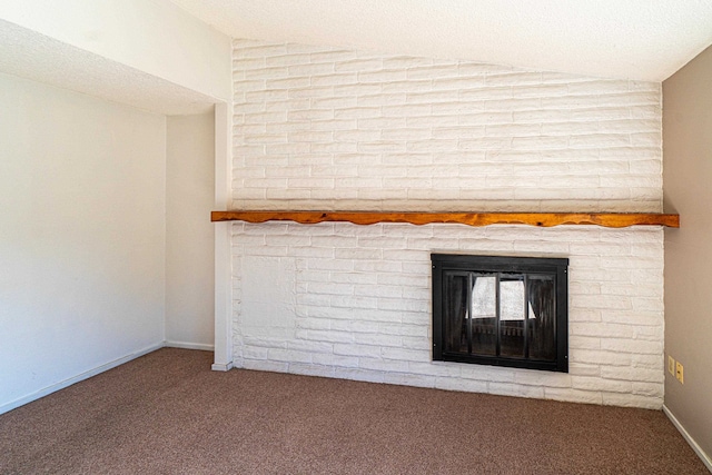 details with a brick fireplace, a textured ceiling, and carpet flooring