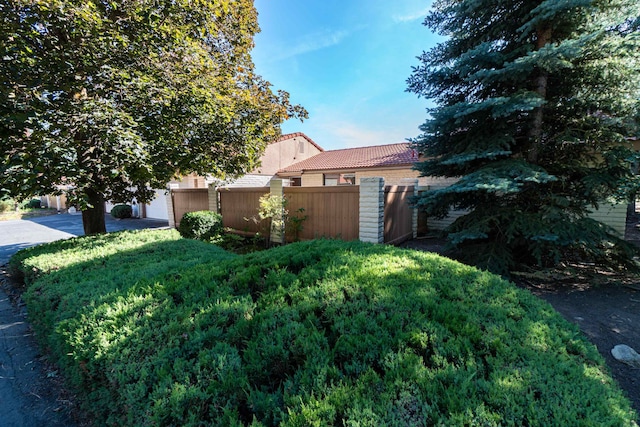 view of yard featuring a garage