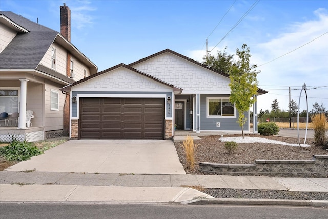 view of front of property featuring a garage