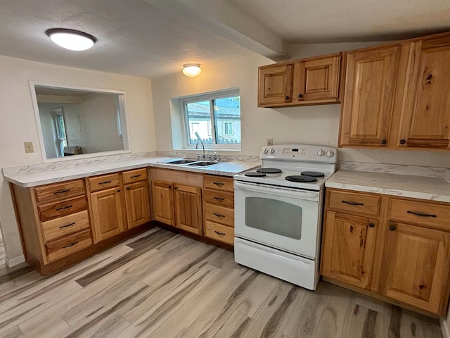 kitchen featuring white electric range oven, a textured ceiling, vaulted ceiling, sink, and light hardwood / wood-style floors