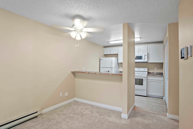 kitchen with white cabinetry, white appliances, baseboard heating, ceiling fan, and light carpet