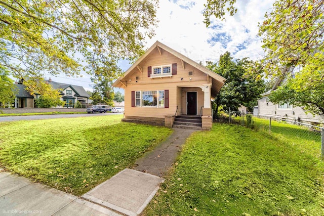 bungalow with a front yard