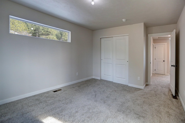 18513 E Michielli Ln, Spokane Valley, WA 99016 - unfurnished bedroom featuring carpet and a closet