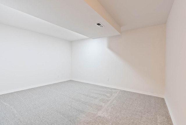 empty room with carpet flooring