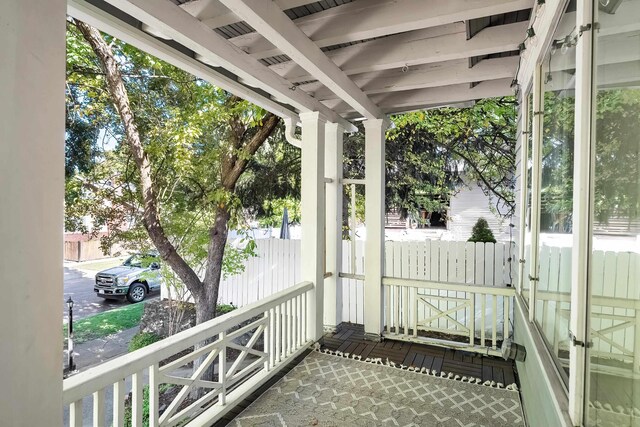 balcony featuring covered porch