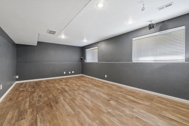 unfurnished room featuring wood-type flooring