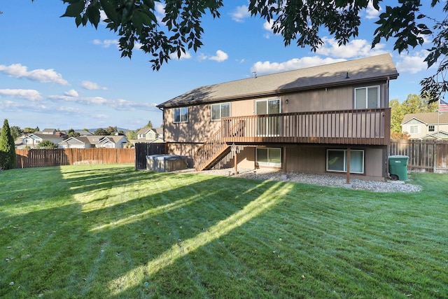 rear view of house with a lawn