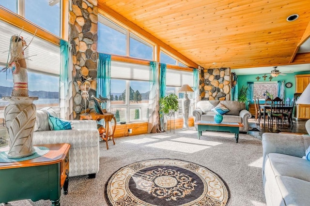 carpeted living room featuring high vaulted ceiling, wooden ceiling, ceiling fan, and plenty of natural light