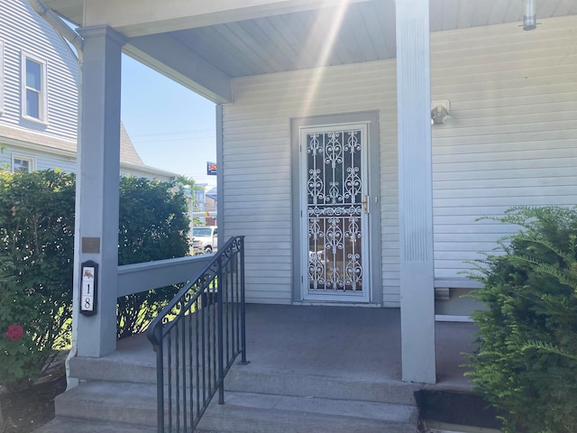 entrance to property with covered porch