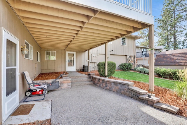 view of patio / terrace with a balcony