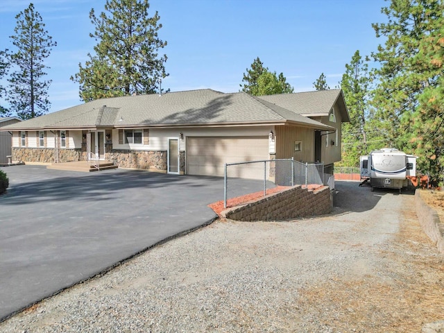 single story home with a garage