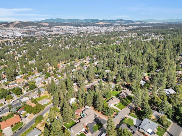 birds eye view of property featuring a mountain view