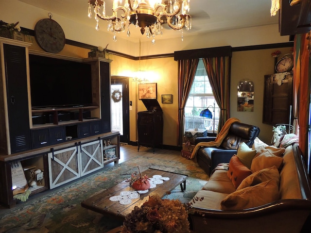 living room featuring an inviting chandelier and hardwood / wood-style floors