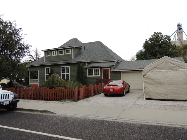 view of front of property with a garage