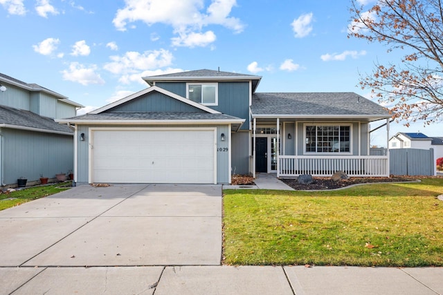 view of front of home with a porch, a garage, and a front lawn