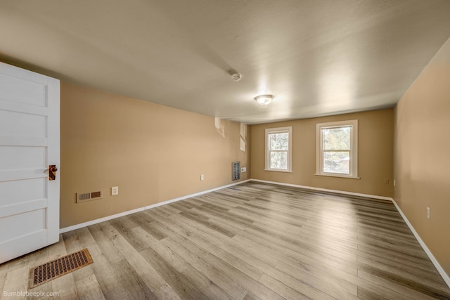 empty room featuring light hardwood / wood-style floors