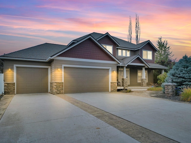 craftsman house with a garage