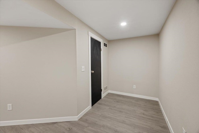 unfurnished room featuring light hardwood / wood-style flooring