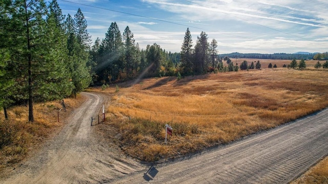 view of street featuring a rural view