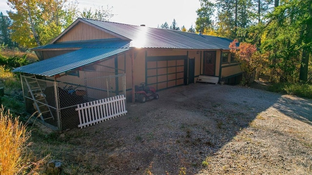 garage featuring driveway