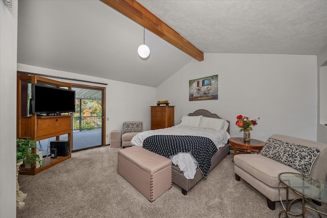 carpeted bedroom featuring a textured ceiling, lofted ceiling with beams, and access to exterior