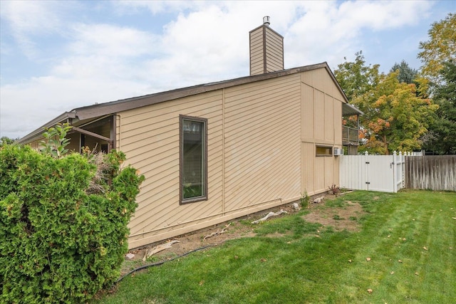 view of home's exterior featuring a lawn