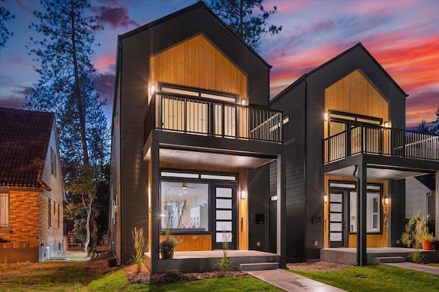 contemporary home with a balcony