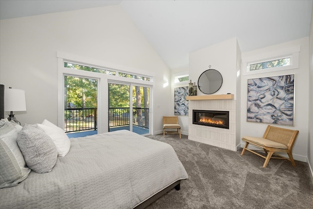 bedroom with dark carpet, high vaulted ceiling, and access to outside