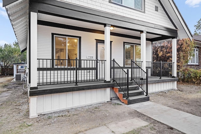 exterior space featuring covered porch and central AC unit