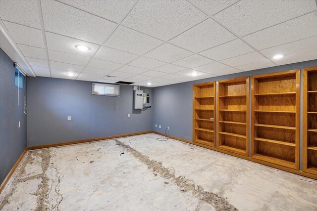 basement featuring a paneled ceiling