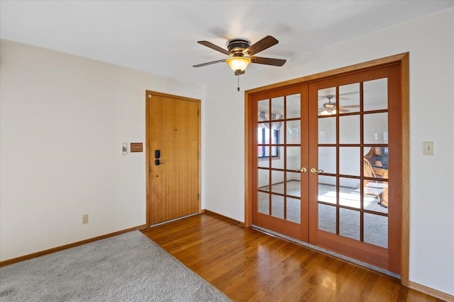 doorway to outside featuring french doors, wood-type flooring, and ceiling fan