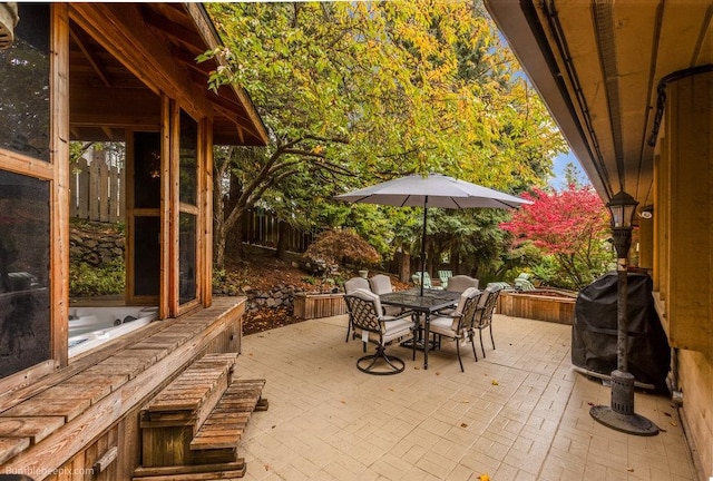 view of patio with a grill