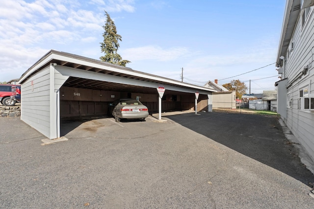 view of car parking featuring a carport