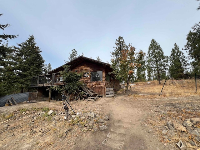 view of front of property with a deck